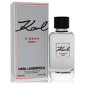 Sophisticated Karl Lagerfeld Karl Vienna Opera 3.3 oz men's Eau De Toilette. Clear bottle, black cap, and sleek silver box.