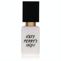 Katy Perry's Indi .33 oz mini EDP spray. Chic frosted white bottle, bold black cap, and luxurious gold band.