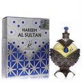 Exquisite Khadlaj Hareem Al Sultan Blue perfume oil. Ornate silver and blue bottle with intricate metalwork and a matching decorative box.