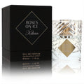 Luxurious Kilian Roses On Ice 1.7 oz Eau De Parfum. Features a stunning faceted glass bottle with gold accents and a sleek black box.