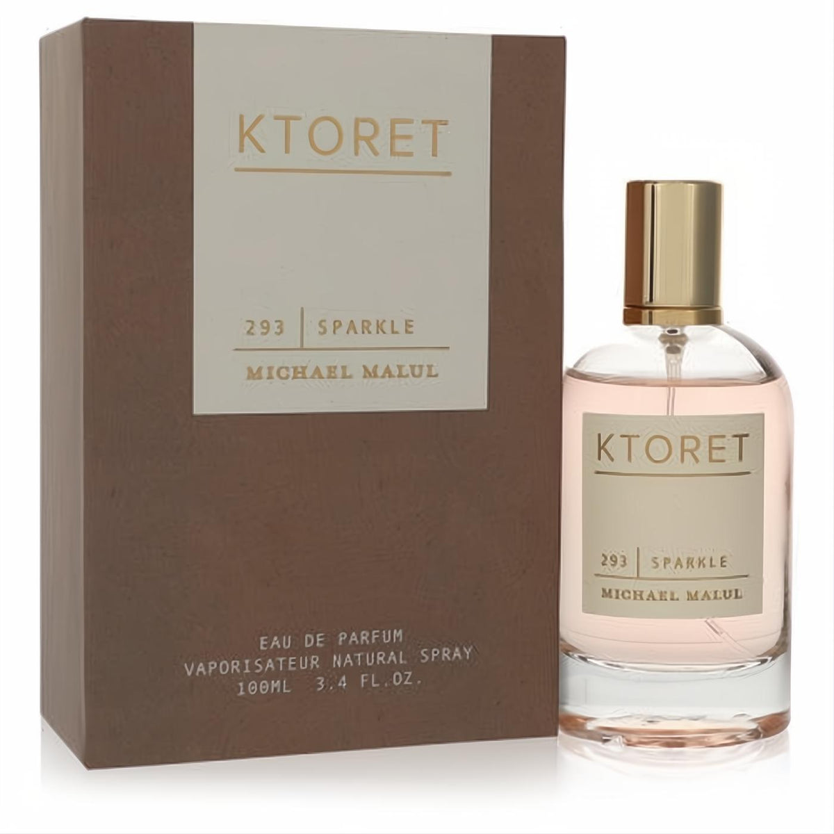 Ktoret 293 Sparkle 3.4 oz EDP. Elegant clear bottle with blush pink fragrance, gold cap, and chic brown box.