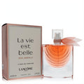 Lancome La Vie Est Belle Iris Absolu 1.7 oz Eau de Parfum. Clear bottle with warm amber liquid, delicate peach ribbon, and elegant rose gold box.