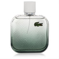 Lacoste L.12.12 Blanc Eau Intense men's EDT. Clear to deep green bottle, iconic crocodile texture, white cap.