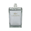 Sleek Lacoste Pour Homme tester cologne bottle, clear glass with silver crocodile logo and "ONSTRATIO" on sprayer.
