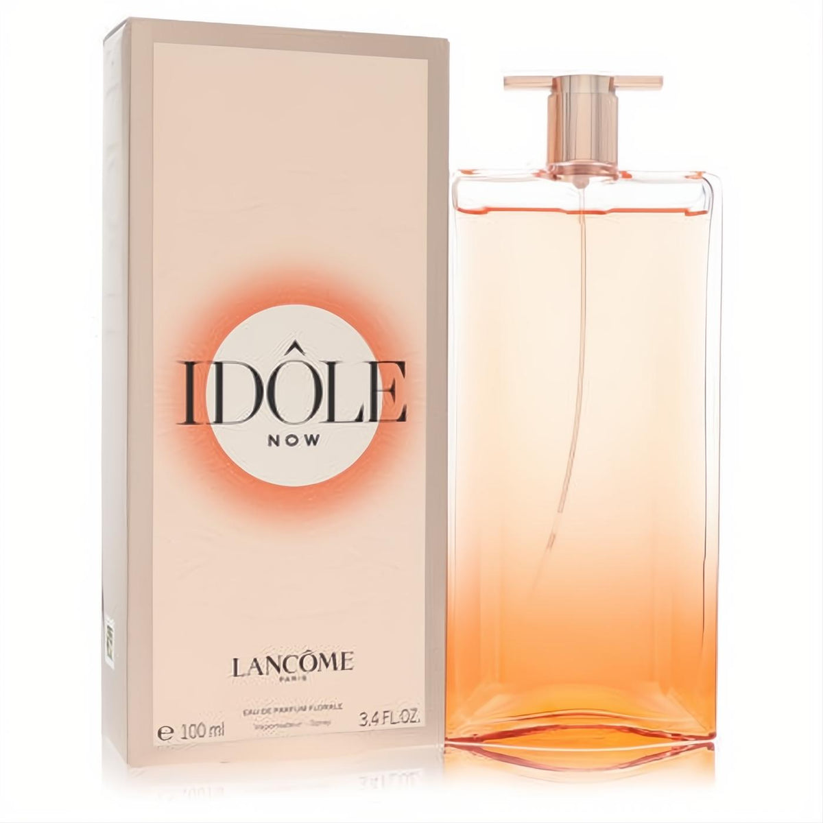 Lancome Idole Now Florale 3.4 oz EDP. Stunning thin glass bottle with warm orange gradient and chic rose gold cap, beside its elegant peach box.