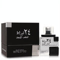 Elegant Lattafa 24 Carat White Gold 3.4 oz unisex EDP. Sleek black box and clear glass bottle with silver label and black base.