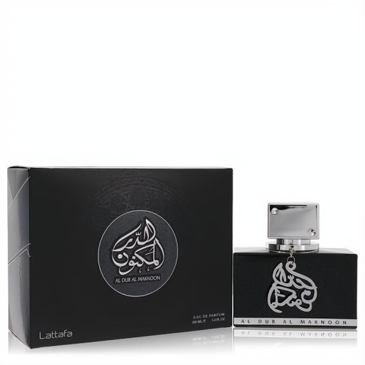Lattafa Al Dur Al Maknoon Silver 3.4 oz unisex EDP. Sleek black bottle with silver cap, charm, and matching box with Arabic script.