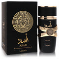 Lattafa Asad unisex Eau De Parfum. Luxurious 3.4 oz black bottle with bold gold accents, lion emblem, and matching elegant box.