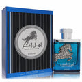 Lattafa Asdaaf Ahal Al Fakhar 3.4 oz unisex EDP. Elegant blue bottle, silver cap, and majestic horse emblem with matching striped box.
