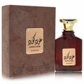 Lattafa Asdaaf Oud Code unisex EDP, 3.4 oz. Rich amber bottle with gold cap, metallic label, and textured brown box.