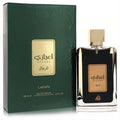 Bold Lattafa Ejaazi 3.4 oz Eau De Parfum spray. Features a dark green box and clear bottle with dark liquid and luxurious gold accents.