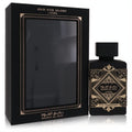 Luxurious Lattafa Oud For Glory Badee Al Oud 3.4 oz unisex EDP. Sleek black bottle with opulent gold art deco design, beside its elegant box.