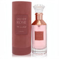 Lattafa Velvet Rose 3.4 oz unisex EDP. Elegant pink ribbed glass bottle with rose gold accents and a luxurious dusty rose velvet box.