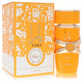 Vibrant Lattafa Yara Tous 3.4 oz EDP spray in an orange bottle with a distinctive gold ribbon and matching floral box.