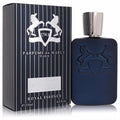 Sophisticated Layton Royal Essence 4.2 oz men's EDP. Dark blue matte bottle with embossed crest, sleek silver cap, and striped box.
