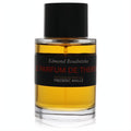 Exquisite Le Parfum De Therese Frederic Malle fragrance bottle. Clear glass showcases golden liquid, topped with a sleek black cap and bold black label.