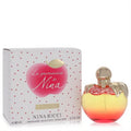 Les Gourmandises De Nina 2.7 oz limited edition perfume. Vibrant apple bottle, yellow-red ombre liquid, gold dripping cap, and polka dot box.