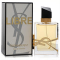 Yves Saint Laurent Libre 1.6 oz EDP: elegant clear glass bottle with golden liquid, iconic gold YSL logo, and sleek black cap.