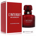 Captivating L'Interdit Rouge Givenchy Eau De Parfum in a bold red glass bottle with elegant black ribbon, beside its matching box.