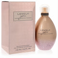 Lovely You SJP 3.4 oz EDP spray. Chic rose gold bottle with sparkling pink glitter base, clear ribbed cap, and matching blush box.