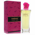 Madonna Treat Me 1.7 oz EDT. Chic clear bottle with pink cap, paired with a vibrant fuchsia box featuring a playful lip print.