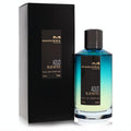 Elegant Mancera Aoud Blue Notes 4 oz unisex EDP in a vibrant blue-to-yellow gradient glass bottle with sleek black cap and box.