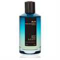 Vibrant Mancera Aoud Blue Notes 4 oz Eau de Parfum in a sleek blue gradient glass bottle with iconic black label and cap.