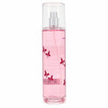Unleash your inner diva with Mariah Carey Ultra Pink 8 oz fragrance mist. Clear bottle, vibrant pink liquid, and playful red butterflies.