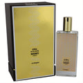 Memo Siwa 2.53 oz EDP spray. Elegant clear glass bottle, gold cap, and matching gold-patterned box for a luxurious fragrance.