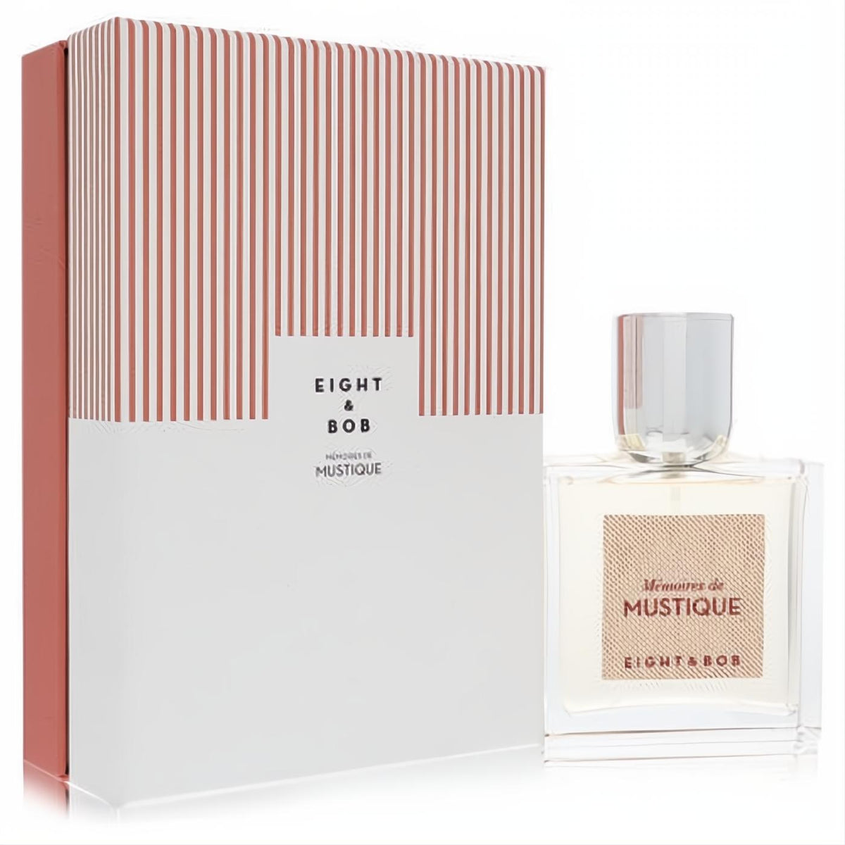 Sophisticated Eight & Bob Memoires de Mustique unisex EDP. Clear glass bottle, silver cap, and elegant white & red striped box.