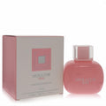 Merazur Pink 3.3 oz Eau De Parfum. Sleek pink bottle with clear cap, showcased with its elegant pink and white geometric box.