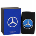 Mercedes Benz Man 3.4 oz EDT: sleek matte black bottle with silver star logo on blue, next to its royal blue box.