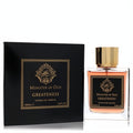 Minister of Oud Greatness 3.4 oz Extrait de Parfum. Luxurious clear bottle with amber liquid, gold cap, and elegant black & gold box.