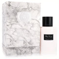 Elegant Miss Vizzari 3.7 oz women's EDP in a sleek blush pink bottle with a black cap, beside its luxurious marble box.