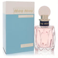 Miu Miu L'eau Rosee 3.4 oz Eau De Toilette. Elegant pink faceted glass bottle with gold accents and a stylish light blue box.