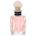 Miu Miu L'eau Rosee 3.4 oz EDT. Luxurious faceted glass bottle with delicate pink fragrance and a chic nude cap.