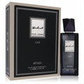 Afnan Modest Pour Homme Une 3.4 oz EDP. Sleek dark bottle with a faceted cap, presented in an elegant black and silver box.