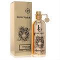 Experience Montale Bengal Oud 3.4 oz unisex EDP. A gleaming gold metallic bottle with a fierce tiger design and matching box.
