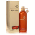 Captivating Montale Honey Aoud 3.4oz EDP. Amber metallic bottle with gold cap and charm, displayed with its elegant gold box.
