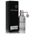 Montale Intense Tiare 1.7 oz EDP in a stunning metallic silver bottle with signature charm, beside its elegant black box.