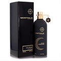Luxurious Montale Oud Dream 3.4 oz EDP in a matte black bottle with gold cap, charm, and elegant crescent design.