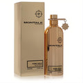 Montale Pure Gold 3.4 oz Eau De Parfum. Elegant gold metallic bottle with unique clip cap, star charm, and matching box.