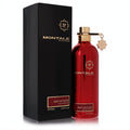 Montale Red Vetiver 3.4 oz EDP spray. Vibrant red metallic bottle with gold cap and charm, paired with its sleek black box.