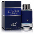 Bold Montblanc Explorer Ultra Blue 3.3 oz men's EDP spray in a sleek dark blue bottle with silver cap, beside its matching box.