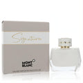 Luxurious Montblanc Signature 3 oz EDP in a modern white faceted glass bottle with gold cap, beside its elegant beige box.