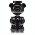 Iconic Moschino Toy Boy men's EDP spray in a glossy black teddy bear bottle with prominent silver branding.