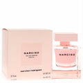 Elegant Narciso Rodriguez Cristal 3 oz EDP spray. Clear glass bottle with radiant pink perfume, matching pink cap and box.