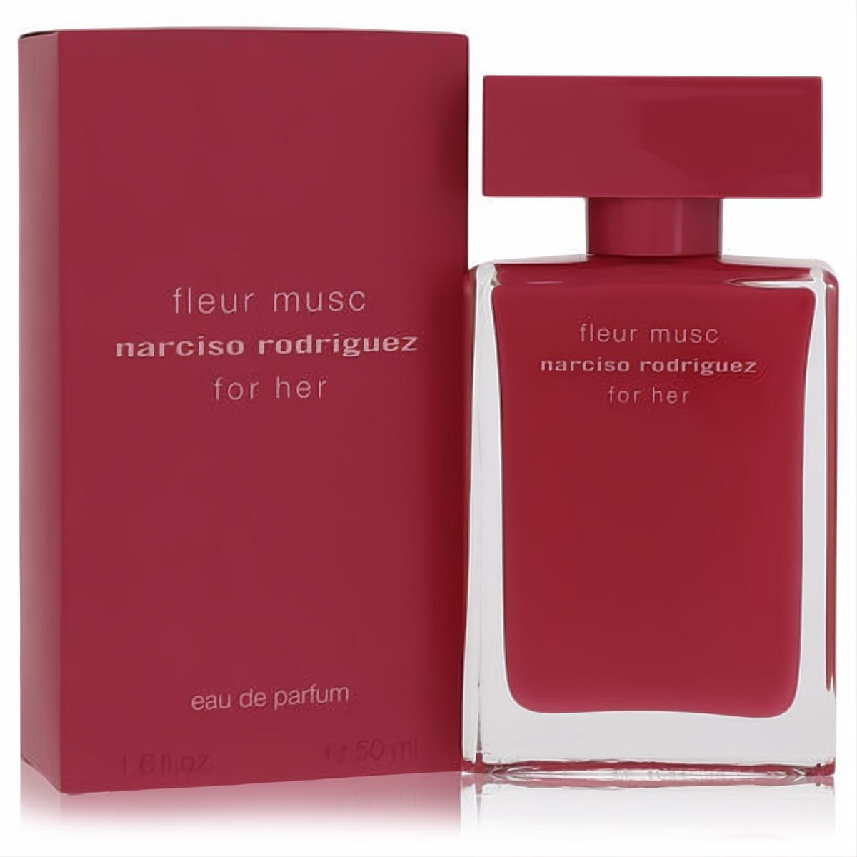 Vibrant fuchsia Narciso Rodriguez Fleur Musc 1.6 oz Eau De Parfum spray bottle and matching box. Luxurious women's fragrance.