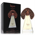 Niche Emarati Ghinwa by Lattafa unisex EDP. Elegant clear bottle, amber liquid, unique ornate bronze cap, black box. 3.4 oz.