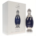 Exquisite Niche Emarati Lujain 3.4 oz unisex EDP. Features a luxurious navy blue bottle with ornate silver accents and spiky cap, with its white box.